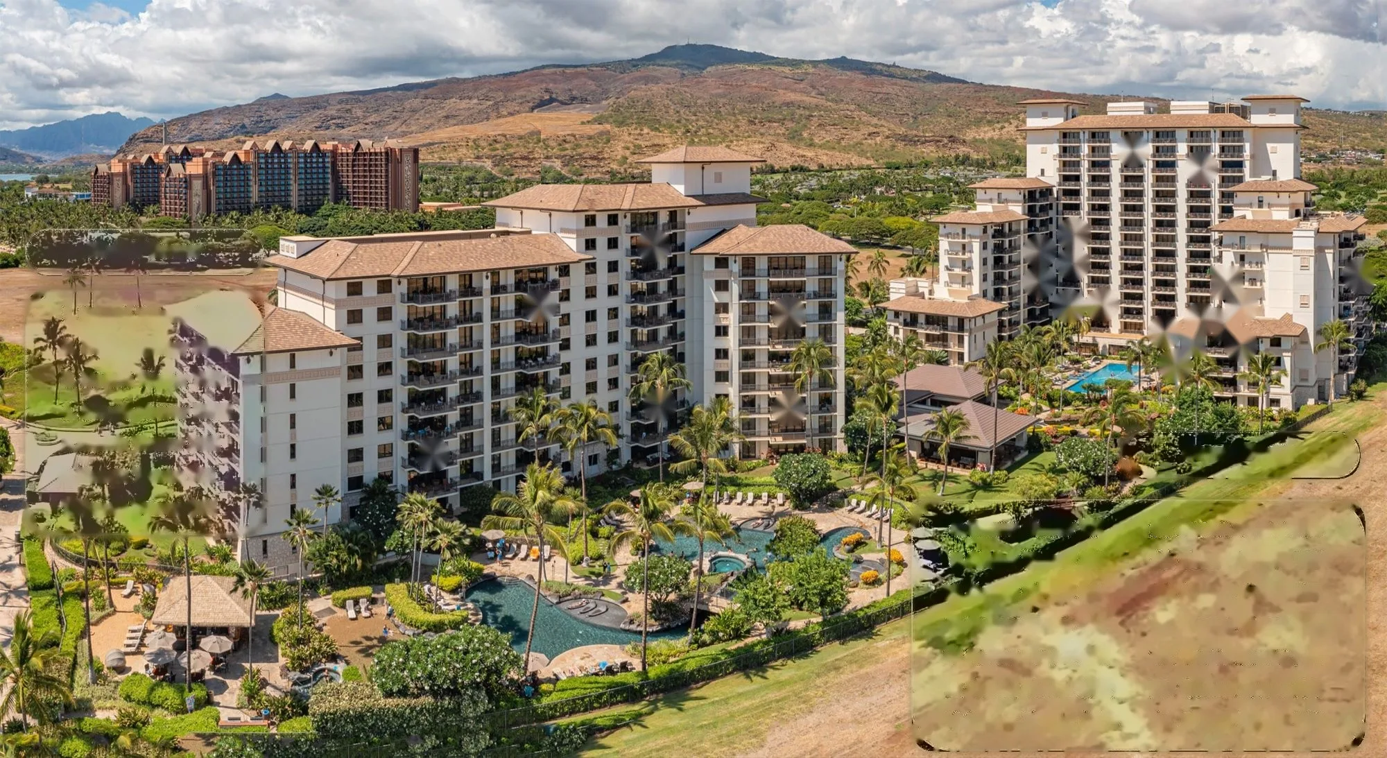 Beach Tower and Ocean Tower from the pool side, with every member villa numbered