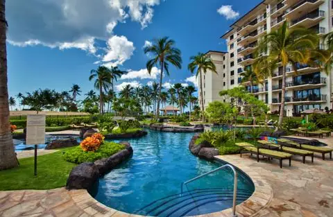 Gardens, paths and lagoon pool between the towers